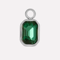 Close-up of silver stainless steel necklace pendant with large emerald cut green gemstone - Silver/Green
