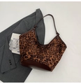Modieuze shopper met luipaardprint, bruine leren riemen en een stijlvol emmermodel - Tan