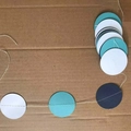 White, turquoise, and dark blue circular paper garland with white cotton stitching for parties - 2 Meters / Dark Light Blue White Circles
