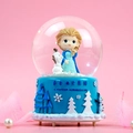 Cute Frozen music box snow globe with Elsa and Olaf figures on a blue resin base - Blue Ice Theme