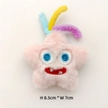 Detailed view of pink star monster plush brooch with blue, yellow and purple tentacles - Original (Back Opening) / Pink Monster