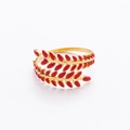 Detail of 18K gold plated leaf ring featuring vibrant red enamel on adjustable band - Gold with Red Leaf