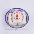Modelo realista de repostería china de nuez y dátil en un tazón de porcelana azul - Pastel de Dátiles y Nueces