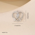 Macro shot showing dimensions and weight of a silver heart pendant with zircon stone - White Gold Heart Knot (MYYX00676)