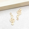 Set of two golden treble clef musical note charms for DIY jewelry making and crafts - 1pc Symbol Charm