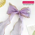 Purple chiffon bow hair clip with silver snowflakes and gold trim for girls - Purple Streamer Bow Hair Clip (A190-09)