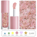Macro detail of glitter gel showing mixed pink hexagonal and star shapes for face and body - Holographic Pink ZL499