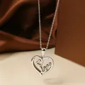 Exquisite silver titanium steel hollow heart necklace featuring Love engraving and zircon - Steel Color Heart Necklace N0453S