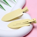 Detail of cream yellow matte hair clips showing front and back clip mechanism - Yellow - Glossy without Letters