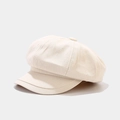 Detailed view of the vintage cream corduroy texture on the newsboy octagonal cap - Off White