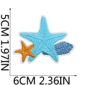 Macro view of blue and orange starfish embroidery patches showing scale and fine stitching - Style 11 (Starfish)