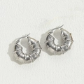 Silver twisted spiral hoop earrings in polished stainless steel for a modern look - Bamboo Joint Hollow Earrings Steel Color / Steel