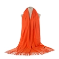 Detailed view of orange cashmere-feel scarf featuring classic fringe tassels and soft texture - Orange