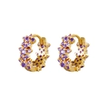 Macro detail of gold-plated hoop earrings with pave-set purple zircon floral accents - Gold with Purple Pave Zirconia