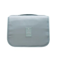 Waterproof light blue travel toiletry bag with hanging hook and travel lettering - Lake Blue