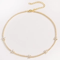 Detail of gold floral tennis bracelet with micro-paved cubic zirconia and adjustable clasp - White