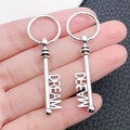 Set of two silver vintage dream key pendants featuring hollow dream lettering detail - Dream Letter Key (3343)