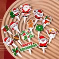 10-piece Christmas cake toppers set featuring Santa, snowman, and gingerbread man - Snowman with Yellow Headphone Toppers 10 Sets