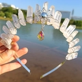 Handcrafted silver tiara featuring natural clear crystal points and a golden sun pendant - White/Sun/White Pendant