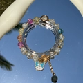 Colorful beaded bracelet featuring a blue cat charm and gold spacers on a mirror surface - S020-blue Kuromi Mixed Color Burst Bracelet #sz428