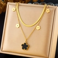 Elegant gold double-layer titanium necklace with black clover pendants in a jewelry box - Double Layer Black Flower Style (N3049)