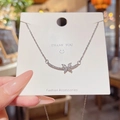 Silver bowknot butterfly necklace in titanium steel with shimmering cubic zirconia stones - X135 Silver Flower Curved Zirconia