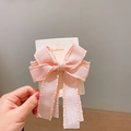 Pink silk bow hair clip for girls with elegant beaded edge and translucent ribbon - Pink