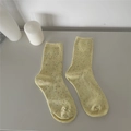 Light yellow ribbed cotton mid-calf socks with colorful flecks on a minimalist gray background - One Size / Yellow