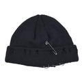 Detailed view of black distressed knit beanie hat with safety pin and metal rings - Adjustable / Black