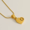 Collier chaîne serpent dorée avec pendentif cœur, zircon rond et détails ajourés - Lettre O