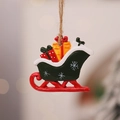 Detail of vintage resin green Christmas sleigh ornament with gifts and snowflake pattern - Style 7 (Green Gift Sleigh)