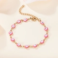 Vergulde roestvrijstalen armband met roze emaille boze oog bedeltjes en handige karabijnsluiting - Roze