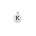 Macro shot of silver stainless steel round pendant with engraved black letter K detail - Steel Letter K