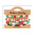Detailed view of Christmas beaded bracelet set with reindeer and gift box charms on card - Christmas Combo Style (BR24Y0436-10)