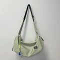 Light green sports gym and yoga crossbody bag with black adjustable strap and cord detail - Green + Green Lanyard
