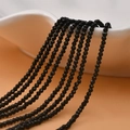 Detailed view of 2mm faceted black crystal round beads for DIY jewelry making - Black