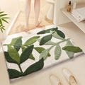Green leaf shaped plush bathroom mat with non-slip backing and absorbent flocking texture - 40*60cm / Dancing Green Leaves
