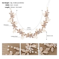 Detail of bridal hairband with golden leaves, pearls and rhinestones measuring 33.5cm long - Gold