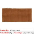 Detail view of brown ribbed knit sports headband showing 19.5cm x 8.8cm dimensions - Brown