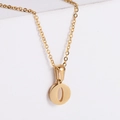 Close-up of polished 18k gold plated letter O pendant on a delicate cable chain - Letter O