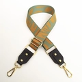 Adjustable wide canvas bag strap with green geometric pattern and gold hardware - No.5 Yellow Leaf Jacquard + Black Leather