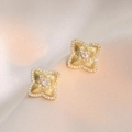 Golden flower stud earrings with micro-inlaid zircon petals and a teardrop center stone - Four-Petal Flower Pear Zirconia Style (E0454)