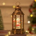 Vintage bronze Christmas lantern with Santa Claus figurine and warm LED glowing snow globe - Standing Santa Claus