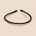 Detail shot of a black glitter headband for women featuring a slim design and fabric ends - Black