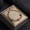 Gold stainless steel bracelet with red green blue zircon and Roman numeral engraving - Multicolor