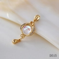 Close-up of gold moonstone pendant with iridescent stone and teardrop detail - D515 Rotating Bead