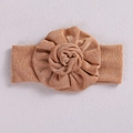 Handmade brown baby headband featuring a large 3D fabric flower on soft elastic material - Tan