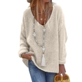 Close-up of beige V-neck long-sleeve knit sweater featuring a loose-fitting silhouette - 2XL / Apricot