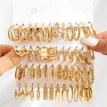 Detailed set of 20 pairs of gold geometric and pearl earrings on display card - Gold Pearl Twist Heart Style (5670901HB)