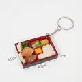 Miniature Taiwan bento box keychain with realistic resin food details, 4.7x3.5x1cm - Abalone Rice Bento